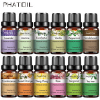 Collection of PHATOIL essential oil bottles with various scents on a white background