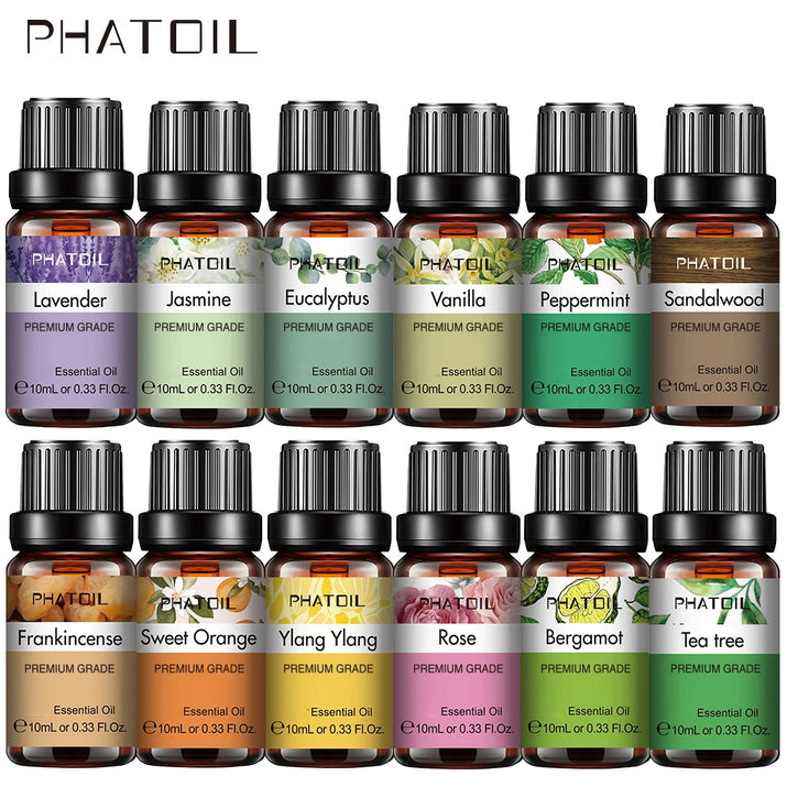 Collection of PHATOIL essential oil bottles with various scents on a white background
